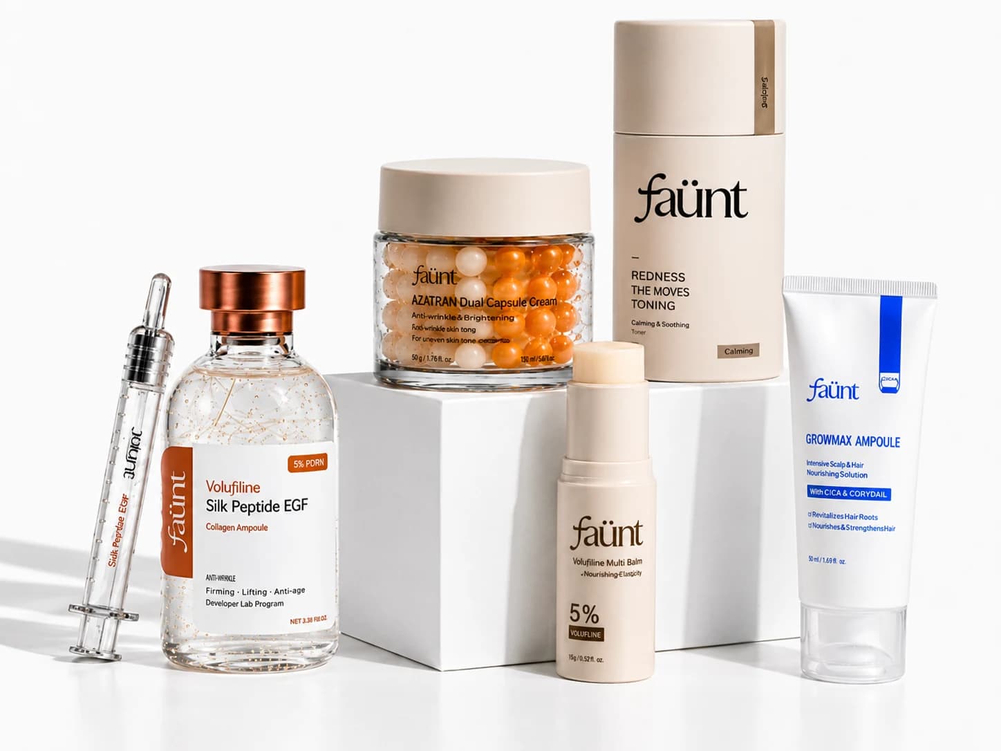 faünt Silk Peptide EGF ampoule, Azatran capsule cream, Volufiline multi balm, toner and GrowMax ampoule arranged on white plinths