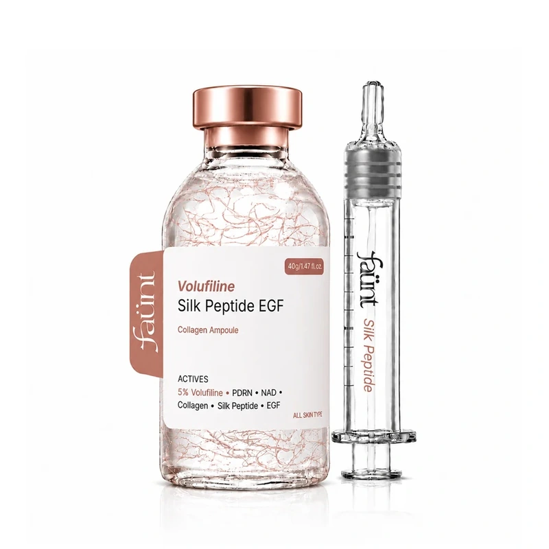 Faünt Volufiline Silk Peptide EGF Collagen Ampoule bottle with rose-gold cap beside precision applicator