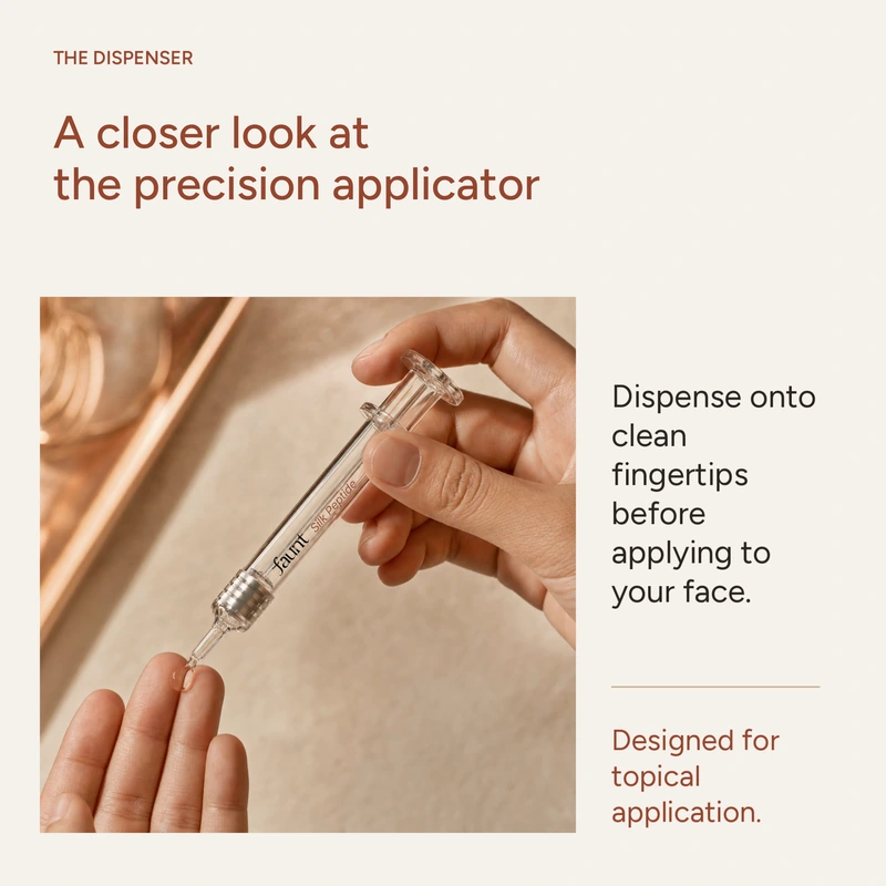 Hand dispensing serum from the precision applicator onto a fingertip